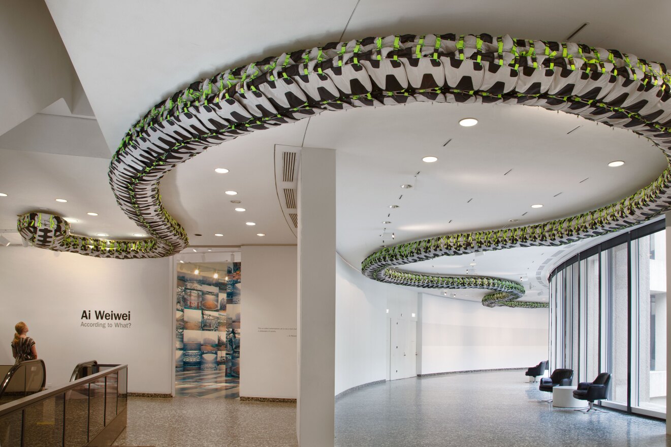 Ai Weiwei's<em> Snake Ceiling,</em> a serpentine form made from children's backpacks, is currently on display at the Hirshhorn Museum's "According to What?" exhibit. It commemorates the thousands of students who died in poorly constructed schools during the 2008 Sichuan earthquake.